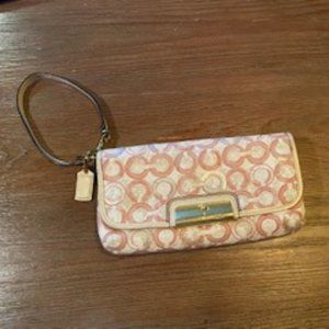 Coach pink and white sequin signature wristlet